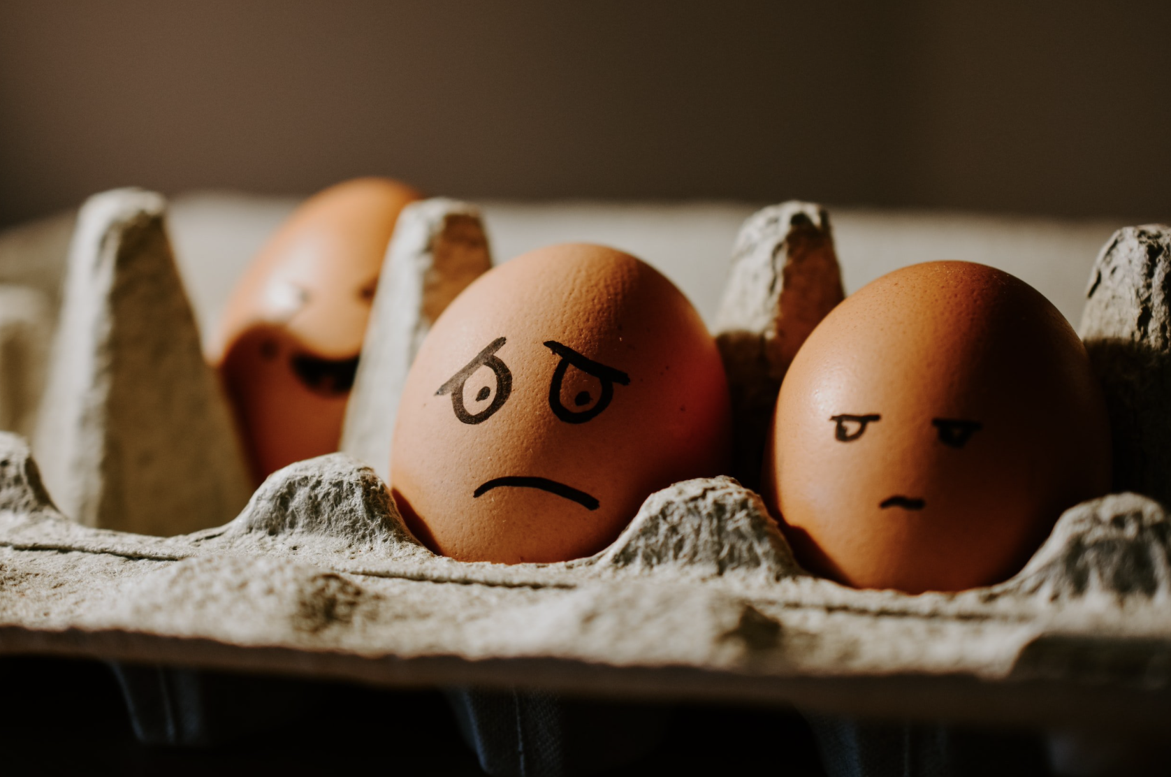 An egg with a sad face drawn on it. With anxiety counseling in NYC, NY, you can learn how to mange your anxiety. Start today by calling us!