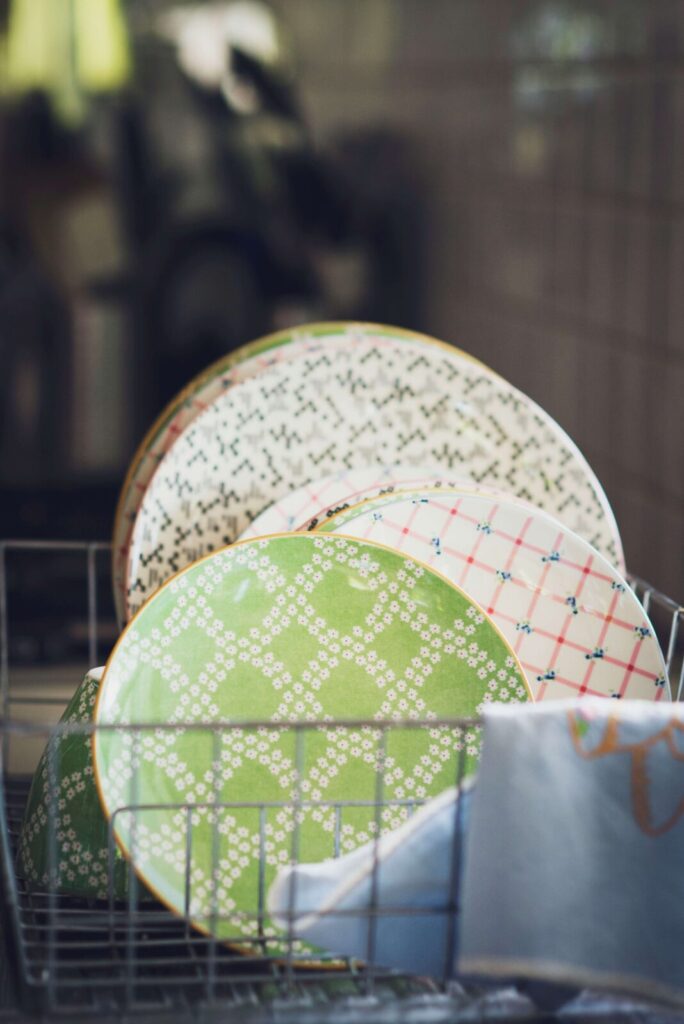 A stack of dishes after being washed. Learn how to develop a mindfulness practice with the help of an anxiety therapist in NYC, NY. Our anxiety counseling can support you!