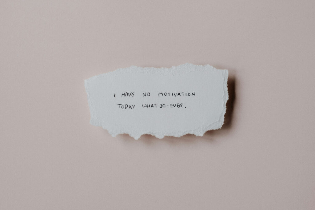 "I have no motivation today what-so-ever" written on a ripped piece of paper. Begin working with an anxiety therapist in NYC, NY to help beat the cycle of procrastination. Call today!