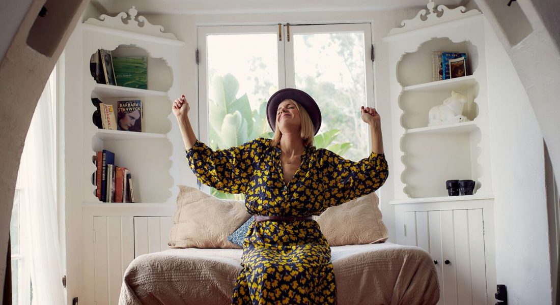 A woman dancing in her bedroom. Representing how anxiety counseling in NYC, NY can help you feel free. Discover anxiety coping mechanisms today!